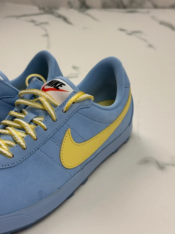 Nike Astrograbber QS Damen Sneaker Hellblau Gelb Gr. 39